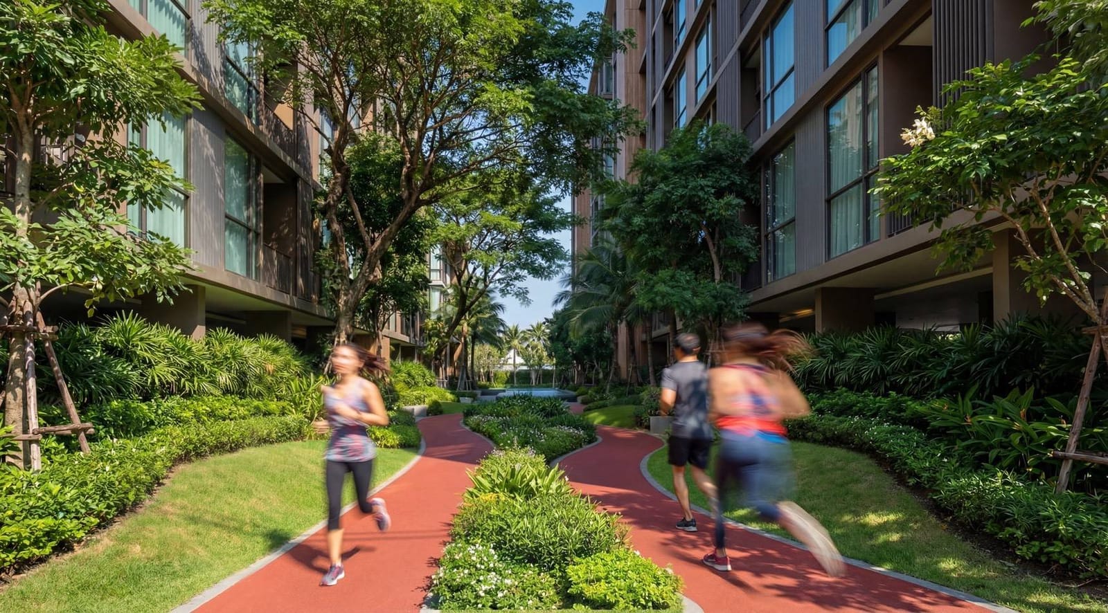 1-Bedroom Condominium for Sale in Chalong, Phuket — Runners on the sloped jogging track through the garden