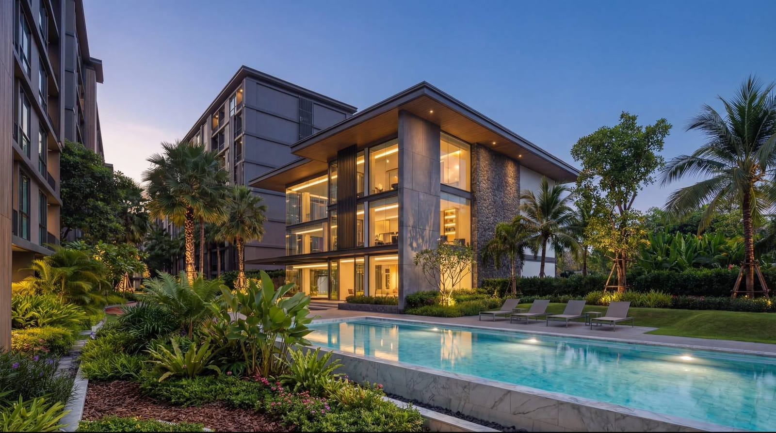 1-Bedroom Condominium for Sale in Chalong, Phuket — Pool and clubhouse in the evening, Chalong Phuket